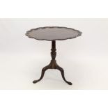 George III and later carved tilt-top table with multi-lobed dished top on birdcage-action and