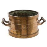 Scarce 19th century colonial bronze grain measure of typical form, with twin flanking handles,