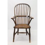 19th century ash and elm Windsor chair with stick back and saddle seat on turned supports united by