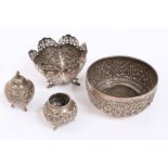 Selection of Indian white metal items - including two dishes and a pepper pot with embossed foliate