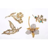 Four 9ct gold floral spray brooches