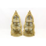 Pair of mid-Victorian giltwood mirrored corner hanging shelves,