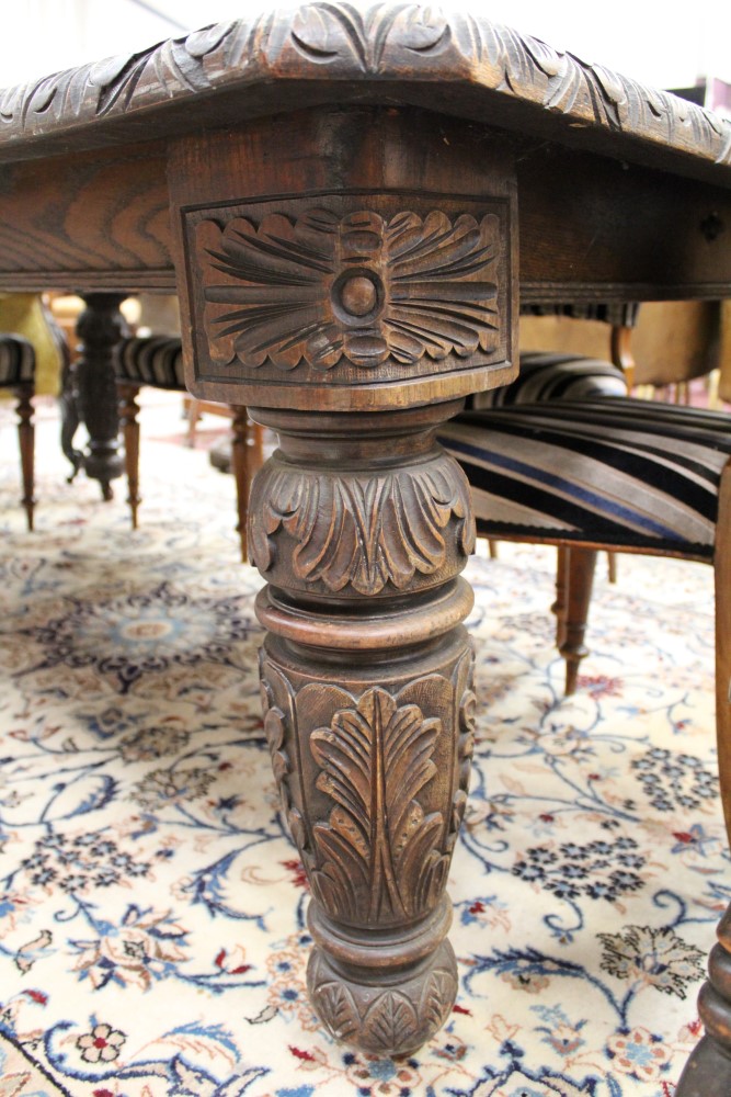 Victorian carved oak extending dining table, the rounded rectangular top with acanthus carved edge, - Image 3 of 4