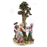 19th century Meissen porcelain figure group decorated with four dancing figures around a tree,