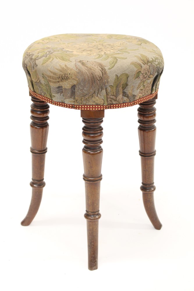 Regency mahogany stool with circular cushion seat on turned legs and splayed feet