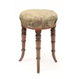 Regency mahogany stool with circular cushion seat on turned legs and splayed feet