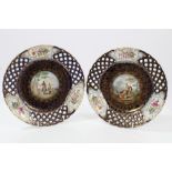Pair early 20th century French Sèvres porcelain dessert plates - both painted with military scenes