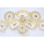 Regency dessert ware with polychrome painted floral sprays with gilt and yellow borders