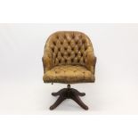 Leather button-upholstered desk swivel chair, tub form seat with close-stud upholstery,