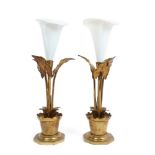 Pair of late 19th century gilt metal epergnes of lily form with opaque glass vases and leaf