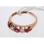 Late Victorian ruby and pearl five-stone ring with three round mixed cut rubies alternating with