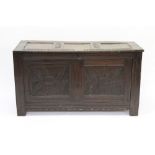 17th century carved oak coffer with triple panel hinged lid,