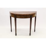 George III mahogany and tulipwood crossbanded demi-lune card table,