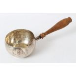 White metal brandy saucepan of cauldron form, with pouring lip and turned wooden handle,