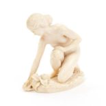 Late 19th / early 20th century Continental carved ivory figure of a female bather,