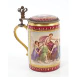 Late 19th century Vienna porcelain tankard with hinged cover, finely painted classical scenes,
