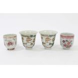 Two 18th century Chinese famille rose porcelain coffee cups with floral decoration and two 20th