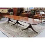 Very large Regency-style mahogany triple pillar dining table,