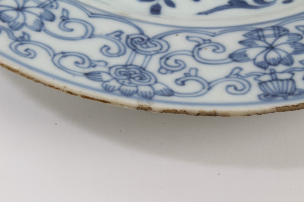 Three 18th century Chinese export blue and white plates with painted floral decoration and precious - Image 9 of 13