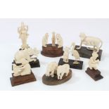 Good collection of 1930s Indian carved ivories - to include baboon and young group on horn base,