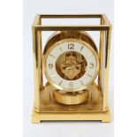 Jaeger-LeCoultre Atmos clock in gilt brass case (some glazed panels missing), 22.