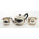 Fine quality George V silver three piece tea set - comprising teapot of compressed baluster form,