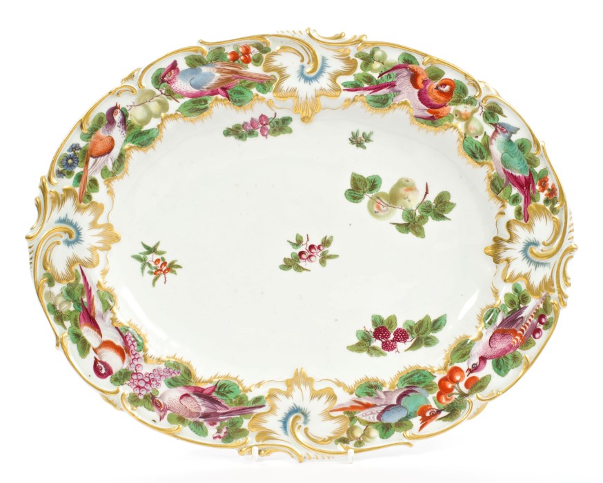 Fine 18th century Chelsea gold anchor oval dish, circa 1760, with polychrome painted bird,