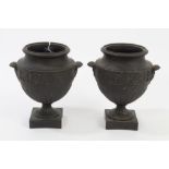 Pair late 18th / early 19th century Wedgwood black Jasper ware urns of bulbous form,