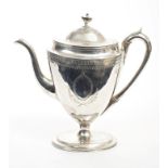 George III silver coffee pot of urn form, with bright cut decoration,
