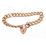 Edwardian rose-coloured metal curb link bracelet with padlock clasp,