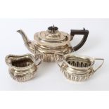 Edwardian composite three piece silver tea set - comprising teapot of compressed baluster form,