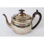 George III silver teapot of oval form, with reeded borders,