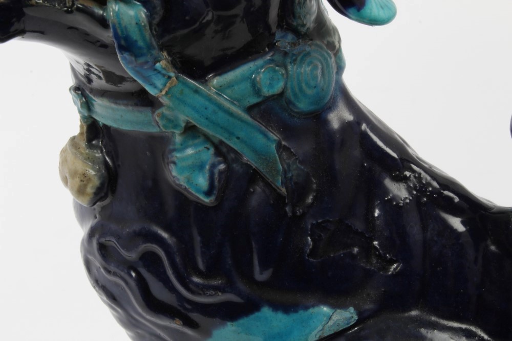 Antique Chinese blue glazed porcelain temple dog, raised on stand with lion mask mounts, - Image 4 of 6