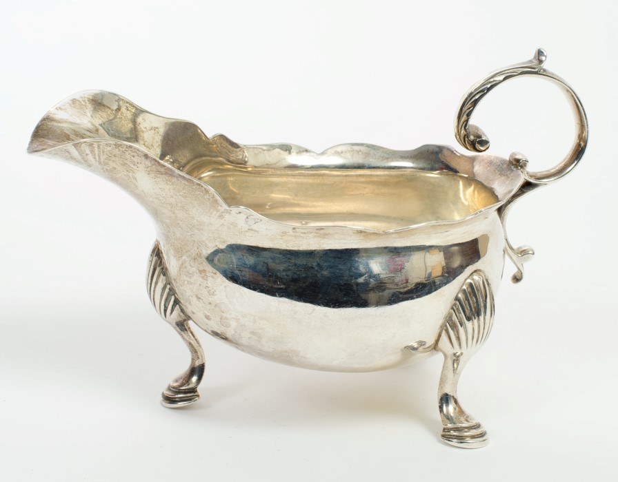 Fine quality late George II silver sauce boat of conventional form,