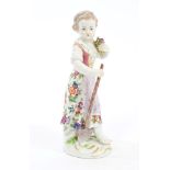 Late 19th century Meissen porcelain figure of a female gardener,