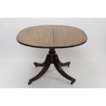 Regency mahogany breakfast table, the oval tilt-top with reeded edge,
