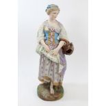 Large late 19th century French porcelain figure of a lady carrying a water jug,