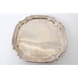 1930s silver salver of square form, with piecrust border and canted corners,