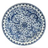18th century Chinese blue and white porcelain charger finely painted with four dragons amid floral