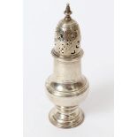 George II silver caster of shaped baluster form, with engraved crest and pierced slip-in cover,