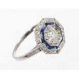 Art Deco-style diamond and sapphire cluster ring with a central old cut diamond estimated to weigh
