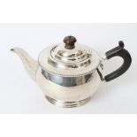 1920s silver teapot of bellied form, with gadrooned border,