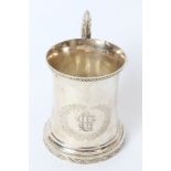 19th century American silver mug of waisted form, with foliate borders,