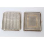 1920s silver cigarette case of rectangular form, with engine-turned decoration and gold borders,