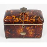 Good George IV blond tortoiseshell tea caddy of domed rectangular outline,