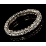 Diamond full band eternity ring with twenty-eight brilliant cut diamonds in four-claw setting.