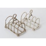 Pair George V silver four-division toast racks with loop handles,