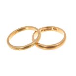 Two 22ct gold wedding rings.