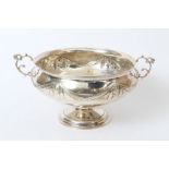 Late Victorian silver twin-handled rose bowl of circular form,
