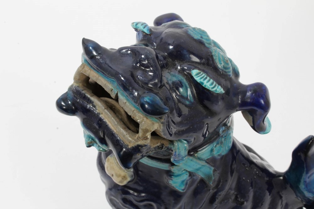 Antique Chinese blue glazed porcelain temple dog, raised on stand with lion mask mounts, - Image 2 of 6